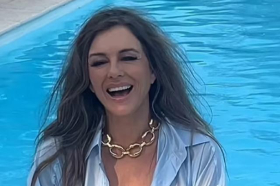 Elizabeth Hurley gömleğinin içine hiçbir şey giymedi!